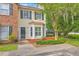 Well-maintained townhome with fresh landscaping and a welcoming front entrance at 811 Reserve Way, Summerville, SC 29485