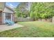 Expansive backyard features a privacy fence and patio seating, perfect for outdoor entertaining and relaxation at 815 Temple Rd # B, Ladson, SC 29456