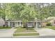Charming single-story home featuring brick accents, a welcoming front porch, and a well-maintained lawn with mature trees at 815 Temple Rd # B, Ladson, SC 29456
