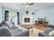 Inviting living room with brick fireplace, plush seating, and outdoor access at 815 Temple Rd # B, Ladson, SC 29456