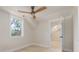 Bright bedroom with a ceiling fan and a window letting in natural light at 83 Avondale Ave, Charleston, SC 29407
