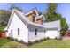 Exterior view of home with fresh landscaping and updated architectural details at 83 Avondale Ave, Charleston, SC 29407