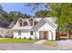 Beautiful exterior view of a home with great curb appeal and manicured lawn at 83 Avondale Ave, Charleston, SC 29407