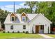 Charming single-story home with a manicured lawn and inviting front door at 83 Avondale Ave, Charleston, SC 29407