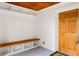 Well-organized mudroom with built-in bench seating and convenient storage space at 83 Avondale Ave, Charleston, SC 29407