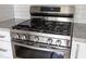 Stainless steel stove with six burners and oven sits in modern kitchen at 83 Avondale Ave, Charleston, SC 29407