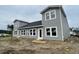 Exterior of the home showcases the new gray siding, black roof, and modern double-hung windows at 855 Descartes St, Summerville, SC 29486
