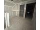 Unfinished bonus room showcasing framed openings for doorways, with drywall partially installed at 857 Descartes St, Summerville, SC 29486