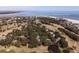 Stunning aerial view of homes and golf course along the beach at 9 Fairway Dunes Ln, Isle of Palms, SC 29451