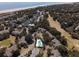 An aerial view of beach homes with a pool and tennis courts and a golf course nearby at 9 Fairway Dunes Ln, Isle of Palms, SC 29451