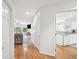 Bright hallway leads to living room and kitchen area at 9 Fairway Dunes Ln, Isle of Palms, SC 29451