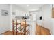Bright kitchen features white cabinets, granite countertops and breakfast bar with seating for casual dining at 9 Fairway Dunes Ln, Isle of Palms, SC 29451