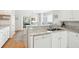 Bright kitchen with granite counters, and stainless steel appliances at 9 Fairway Dunes Ln, Isle of Palms, SC 29451