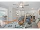Bright living room with view to dining room, comfortable seating and stylish decor for easy entertaining at 9 Fairway Dunes Ln, Isle of Palms, SC 29451