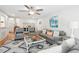 Bright living room with hardwood floors, comfortable seating, and stylish decor for relaxation at 9 Fairway Dunes Ln, Isle of Palms, SC 29451