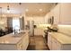 Modern kitchen with stainless steel appliances, granite countertops, and white cabinets at 107 Belgian Ct, Summerville, SC 29486