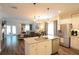 Modern kitchen with stainless steel appliances, granite countertops, open to the living area and dining at 107 Belgian Ct, Summerville, SC 29486