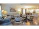 Open living space with living room, kitchen and dining area all connected with nice wooden floors at 107 Belgian Ct, Summerville, SC 29486