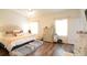 Spacious main bedroom with neutral colors, nice furniture, and hardwood flooring throughout at 107 Belgian Ct, Summerville, SC 29486