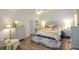 Spacious main bedroom with neutral colors, nice furniture, and hardwood flooring throughout at 107 Belgian Ct, Summerville, SC 29486