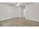 Spacious bedroom with a ceiling fan, plush carpet, and two closets at 116 Bright Meadow Rd, Summerville, SC 29483