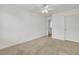 Carpeted bedroom with door, ceiling fan and view to the bath at 116 Bright Meadow Rd, Summerville, SC 29483