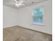 Carpeted bedroom featuring a ceiling fan and a window at 116 Bright Meadow Rd, Summerville, SC 29483