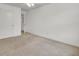 Carpeted bedroom features a door and bright white walls at 116 Bright Meadow Rd, Summerville, SC 29483