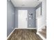 Clean entryway featuring neutral paint and attractive floors, leading to a staircase and other rooms at 116 Bright Meadow Rd, Summerville, SC 29483