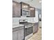 Well-equipped kitchen featuring modern stainless steel appliances, granite countertops, and ample cabinet space at 116 Bright Meadow Rd, Summerville, SC 29483