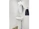 Well-lit powder room featuring a pedestal sink, modern fixtures, and neutral decor at 116 Bright Meadow Rd, Summerville, SC 29483