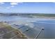 Beautiful aerial view of the community marina and the Intracoastal Waterway on a sunny day with blue skies at 1207 Rivers Reach Dr, Wando, SC 29492