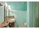 Well-lit bathroom with a granite vanity, vanity mirror and neutral wall paint at 1207 Rivers Reach Dr, Wando, SC 29492