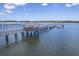 Waterfront gazebo and boat dock on a long pier extending into a beautiful blue waterway at 1207 Rivers Reach Dr, Wando, SC 29492