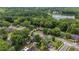 Stunning aerial view of home in a lush, wooded neighborhood near the lake at 122 Hidden Fawn Cir, Goose Creek, SC 29445