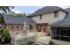 Large wooden deck and a screened in porch overlook the backyard with space for entertaining at 122 Hidden Fawn Cir, Goose Creek, SC 29445