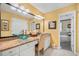 Bathroom featuring a vanity with sink and open access to a tub at 122 Hidden Fawn Cir, Goose Creek, SC 29445