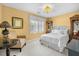 Cozy bedroom with natural light, elegant decor, and a comfortable armchair at 122 Hidden Fawn Cir, Goose Creek, SC 29445