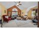 Cozy bonus room with vaulted ceilings, neutral paint, plush seating, and natural light at 122 Hidden Fawn Cir, Goose Creek, SC 29445