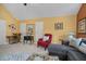 A bonus room featuring neutral paint, plush seating, and natural light at 122 Hidden Fawn Cir, Goose Creek, SC 29445