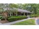 Charming single-story home featuring a covered porch and well-maintained landscaping at 122 Hidden Fawn Cir, Goose Creek, SC 29445
