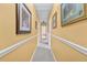 Hallway view featuring wall art and neutral carpet at 122 Hidden Fawn Cir, Goose Creek, SC 29445