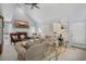 Open living room showcases a vaulted ceiling, fireplace, comfortable seating, and neutral décor at 122 Hidden Fawn Cir, Goose Creek, SC 29445