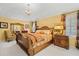 Spacious main bedroom with neutral carpet, decorative lighting, and large windows at 122 Hidden Fawn Cir, Goose Creek, SC 29445
