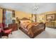 Main bedroom featuring wooden furnishings, neutral carpet, and natural light at 122 Hidden Fawn Cir, Goose Creek, SC 29445