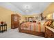Large main bedroom with furniture, chandelier, and neutral carpet at 122 Hidden Fawn Cir, Goose Creek, SC 29445