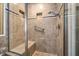 Tiled shower with built-in bench, niche, and modern fixtures at 122 Hidden Fawn Cir, Goose Creek, SC 29445