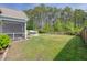 Spacious backyard with a hot tub and wooded area creates a private outdoor oasis at 1245 Hammrick Ln, Johns Island, SC 29455