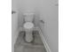 Modern bathroom features a water closet, tiled floors, and neutral color scheme at 1245 Hammrick Ln, Johns Island, SC 29455