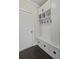 Mudroom features a bench with built-in drawers and wall hooks and baskets for storage at 1245 Hammrick Ln, Johns Island, SC 29455